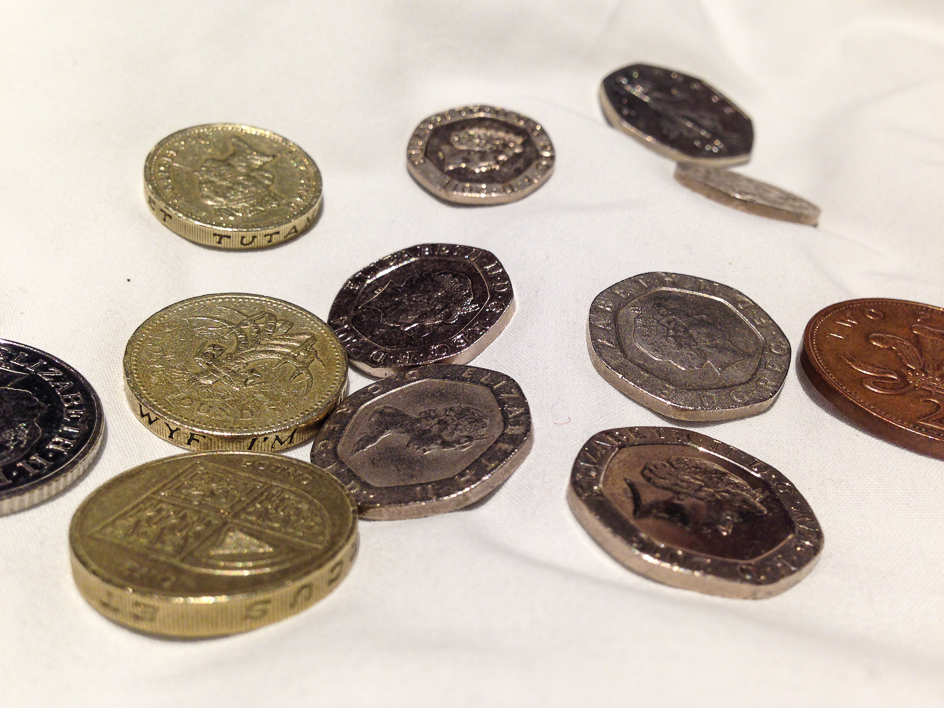Coins with no numbers on them except the 2 cent coin.  A 2 cent coin, really!!!!!